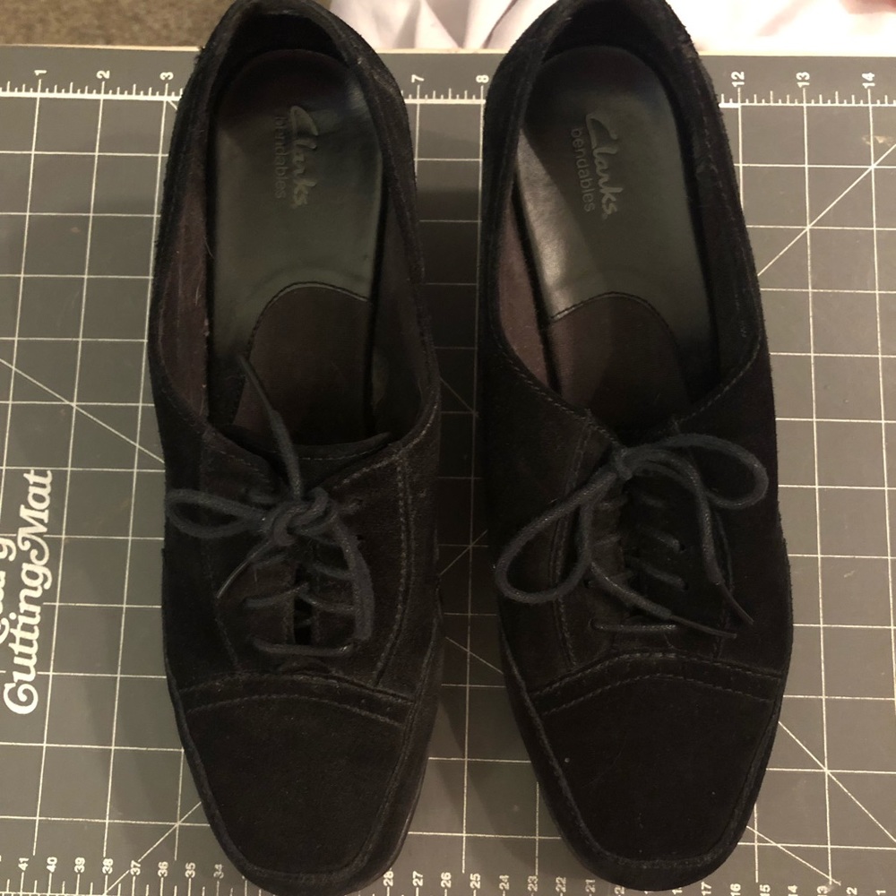 Clark’s black “suede” booties